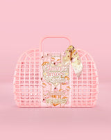 Roze boe-mandje in wafelstijl met een product erin op een roze achtergrond