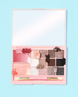 P. Louise Cel mai bine servit Cold Breakfast Bites All In One Paleta de machiaj cu diverse nuanțe pe un fundal albastru deschis