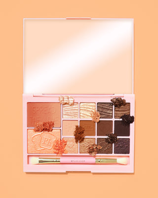 An image of the P. Louise Breakfast Bites All In One Makeup Palette in Toasty & Tempting warm neutral colour way on an orange background