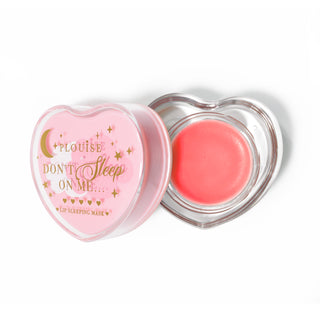 Pink heart-shaped lip sleeping mask with the lid off on a white background