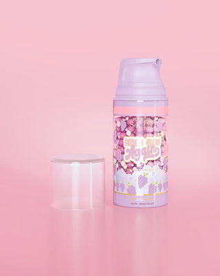 Purple bottle of P. Louise Here I Glow Again Grape Recovery Mask on a pink background