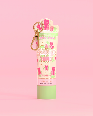Tube of P. Louise A Helping Hand Hand Cream with a candy bear design on a pink background